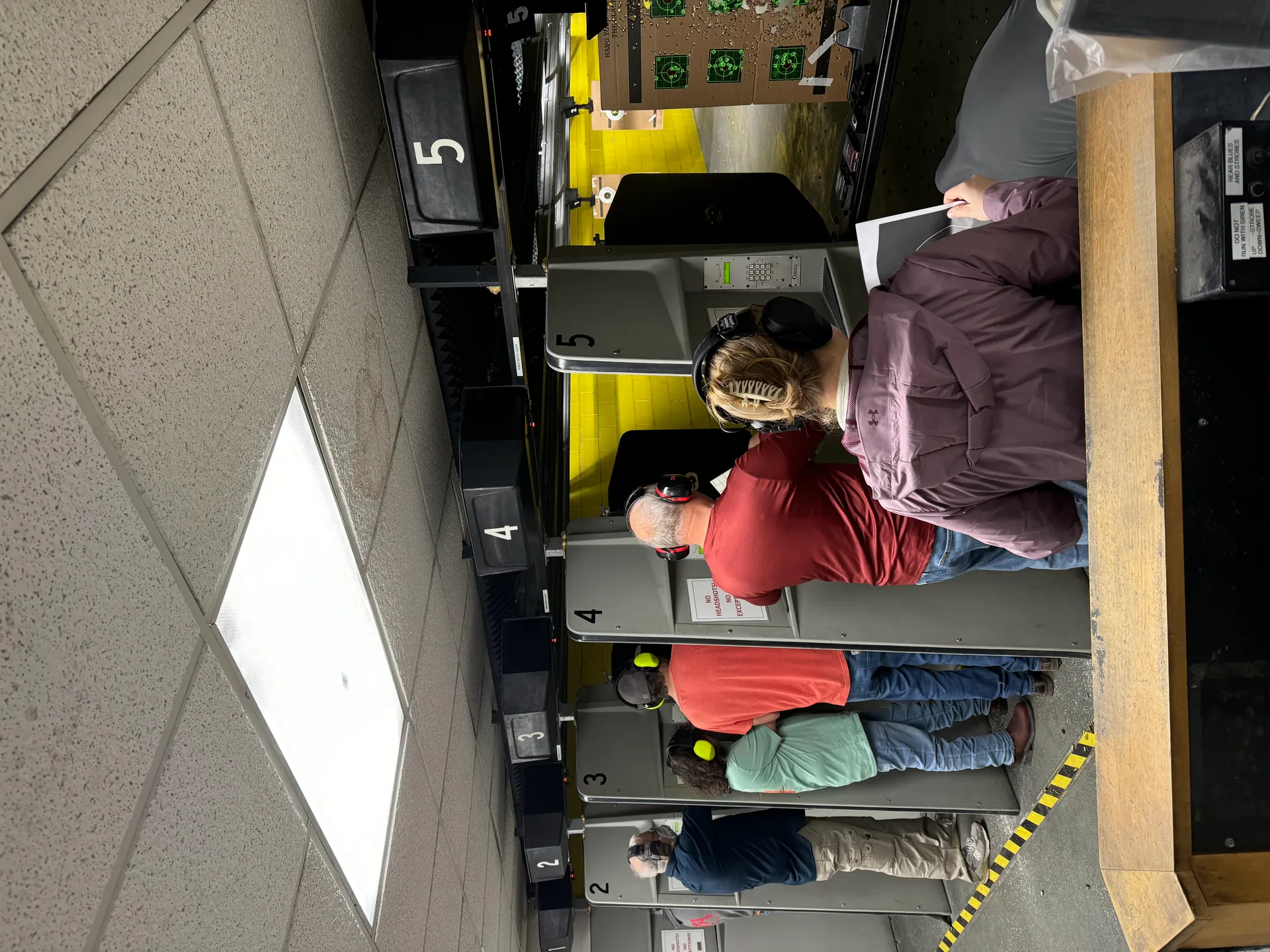 Shooters practicing in the indoor range bays at Lowcountry Guns
